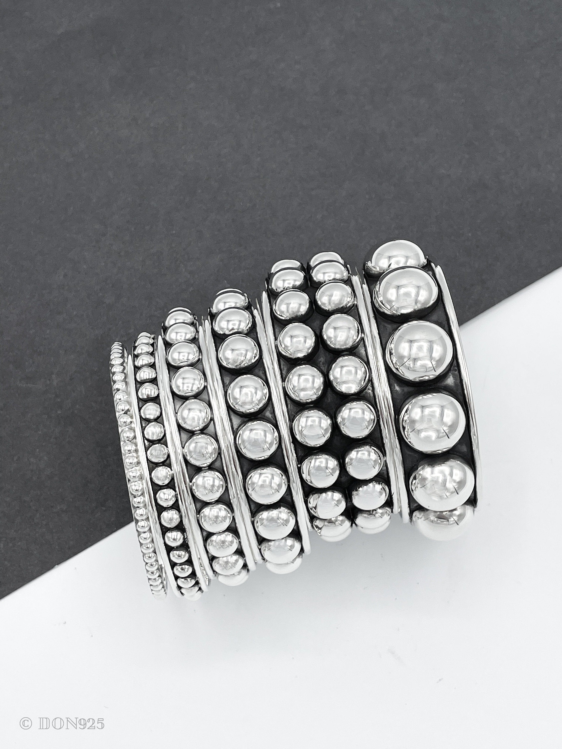 Sterling Silver Southwestern Studded Bangle: Inclusive Sizes