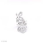 A silver ring with a floral design. The ring is made of two overlapping flowers with a textured surface.