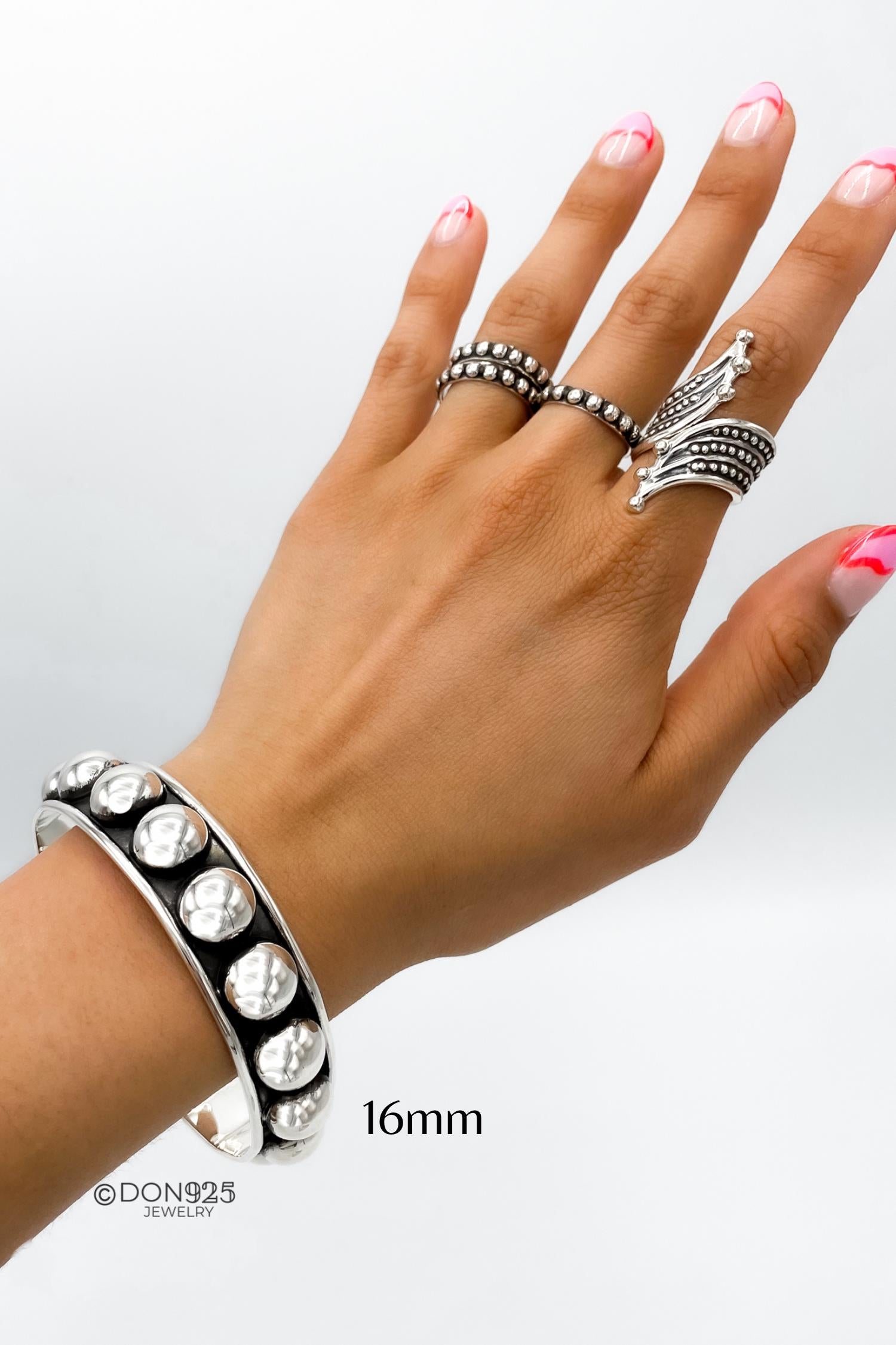 Sterling Silver Southwestern Studded Bangle: Inclusive Sizes