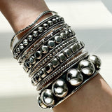 Sterling Silver Southwestern Studded Bangle: Inclusive Sizes