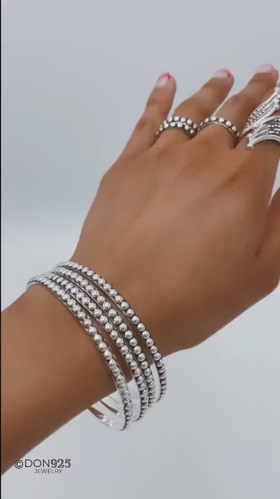 Sterling Silver Southwestern Studded Bangle: Inclusive Sizes